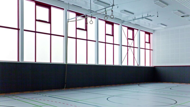 Euregio Gymnasium (School gym) | Bocholt • PLEXIGLAS® Aerogel glazing for the large format single-skin glass facade; U value of 0.77 W/m²K and 8 ventilation flaps.